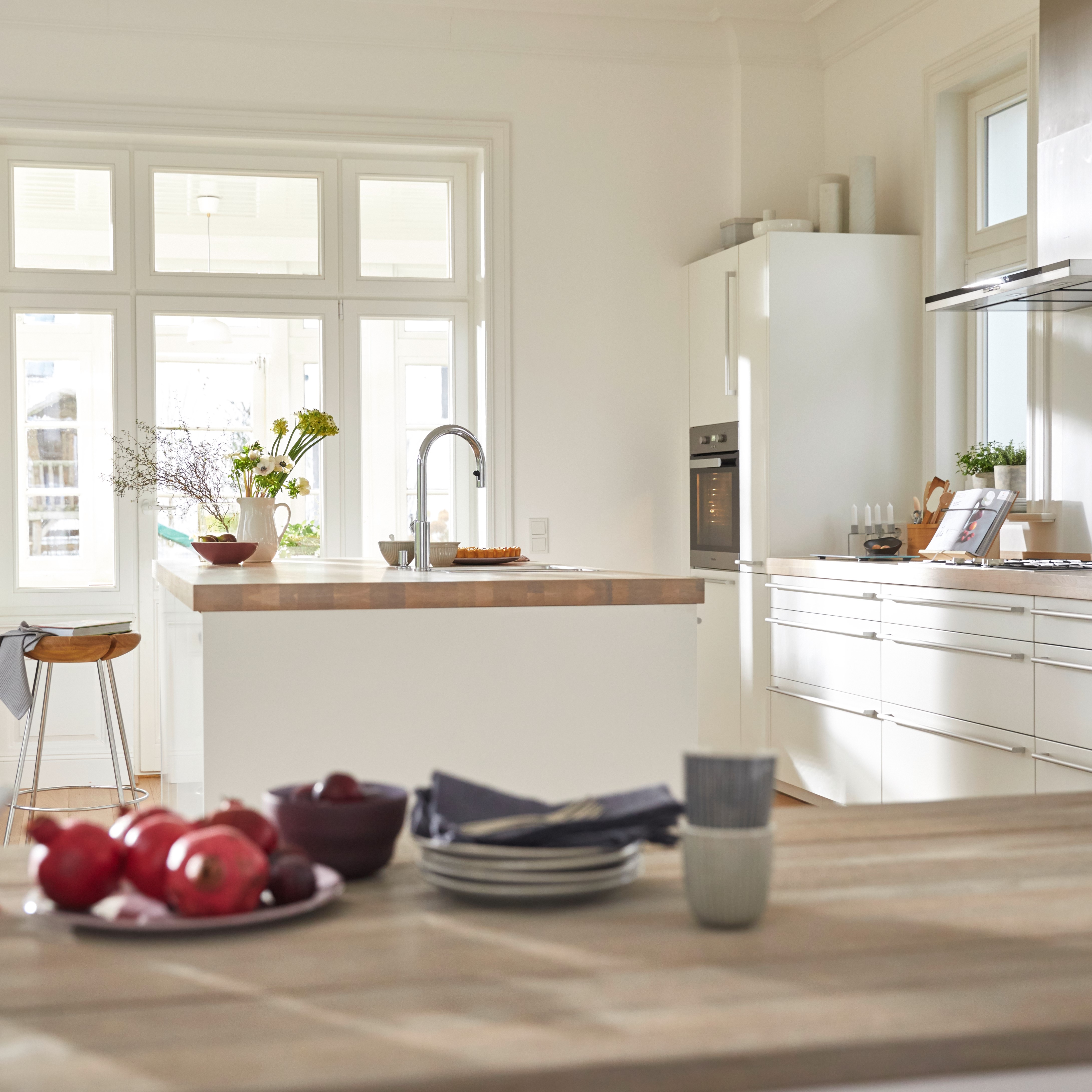 View into a modern, white kitchen