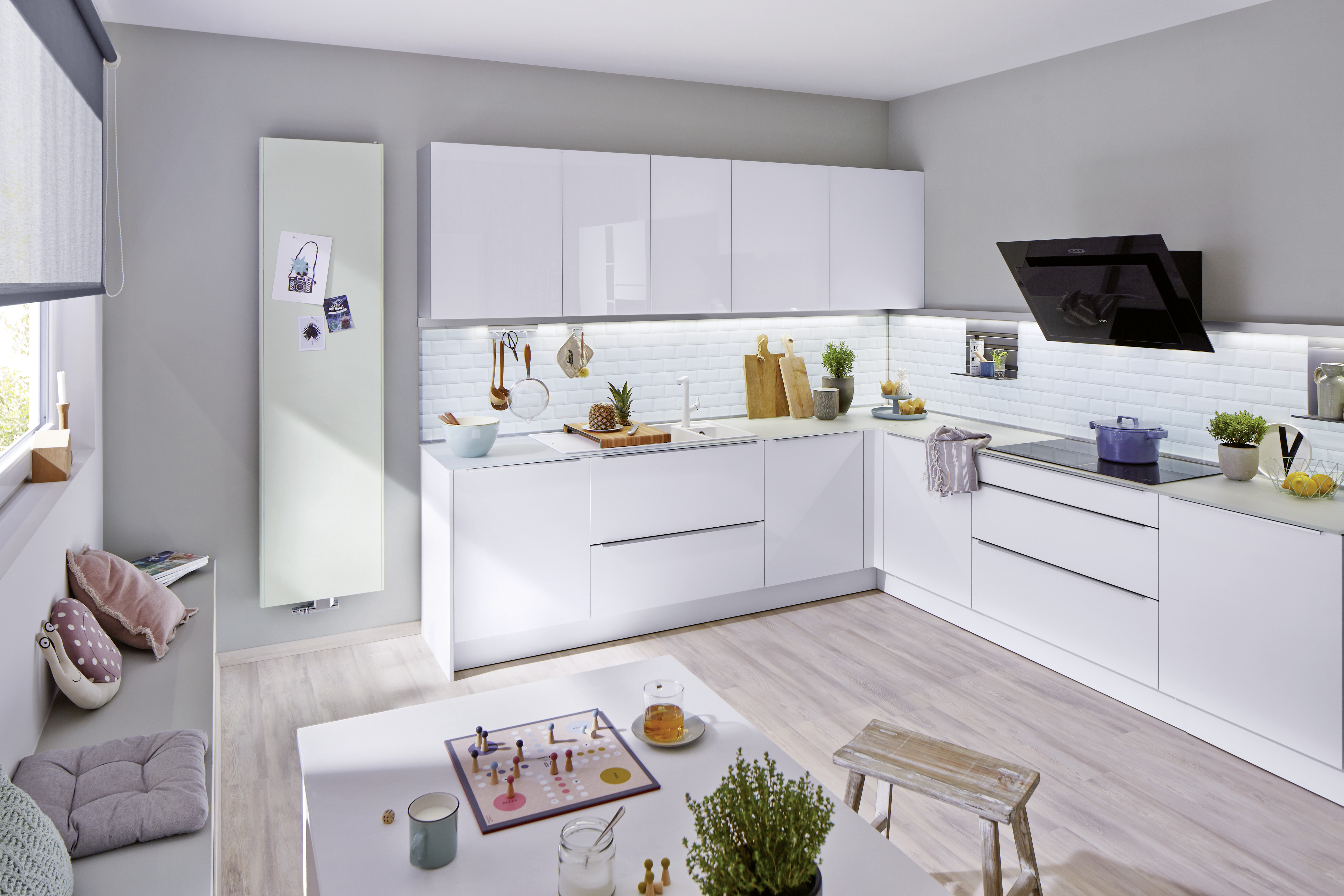 A modern kitchen in white, in the practical L shape